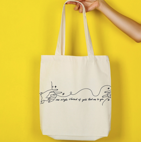 Single Thread of Gold Tote Bag